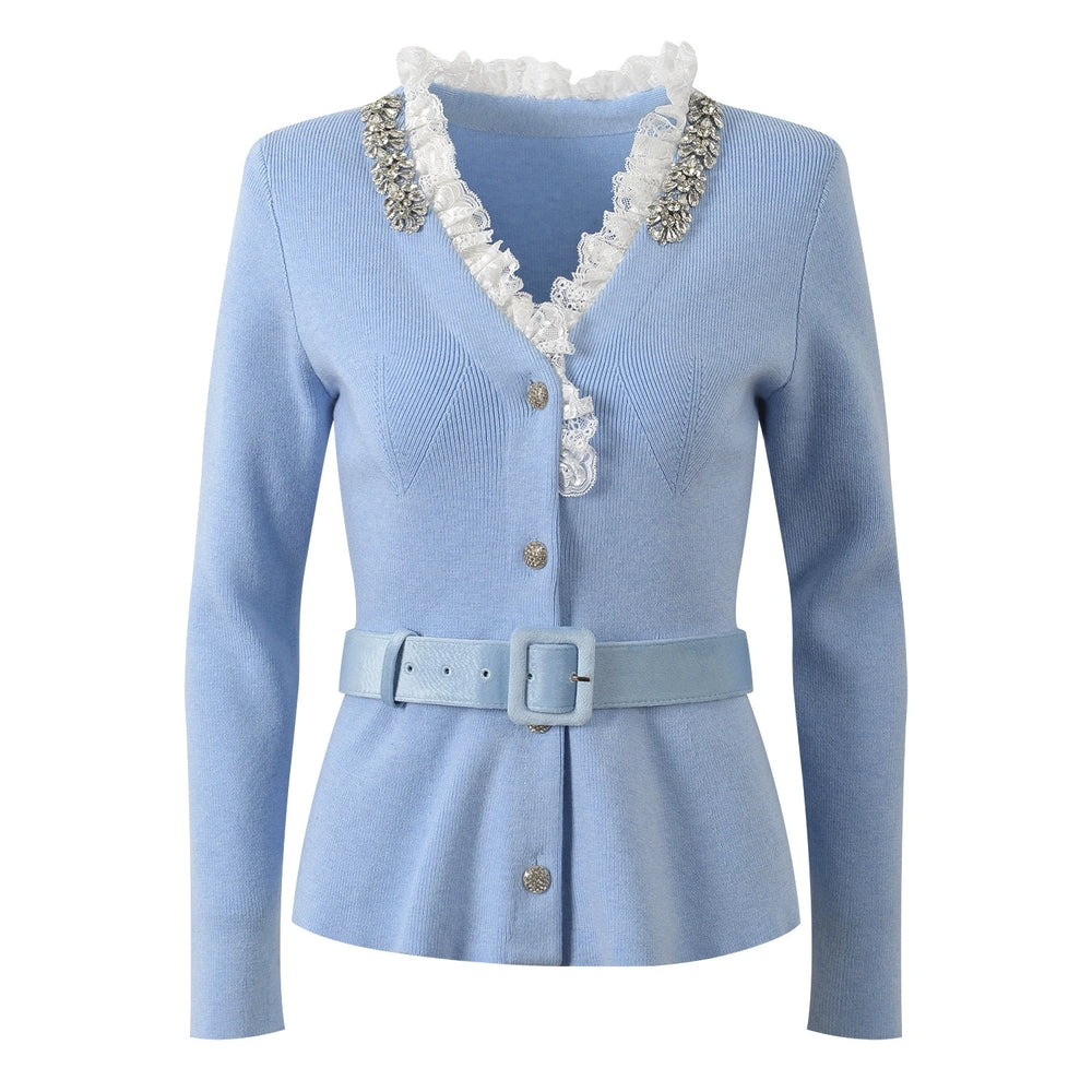 Light blue cardigan with decorative collar and belt on a white background