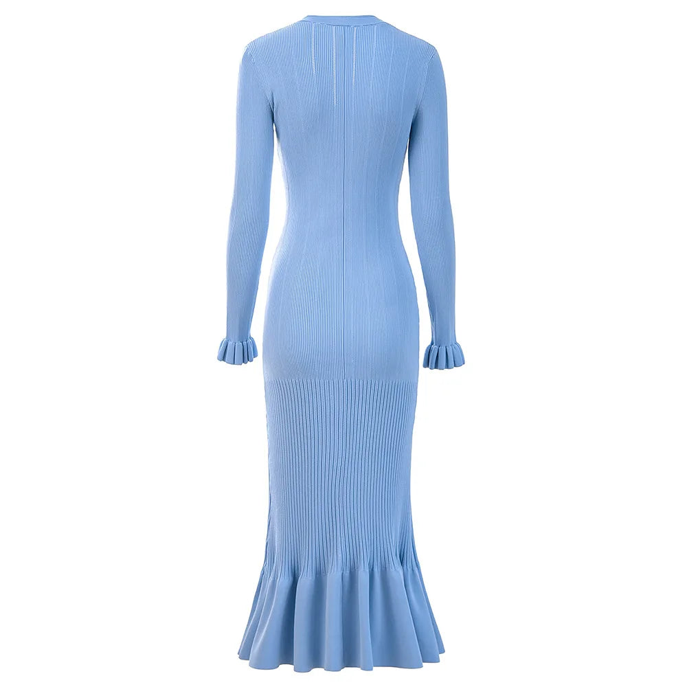 Light blue ribbed dress with buttons on a white background