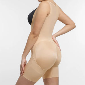 Beige shapewear being worn by a person on a white background