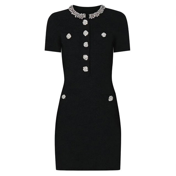 Black dress with decorative buttons and collar on a white background