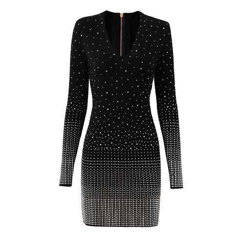 Black dress with silver embellishments on a white background