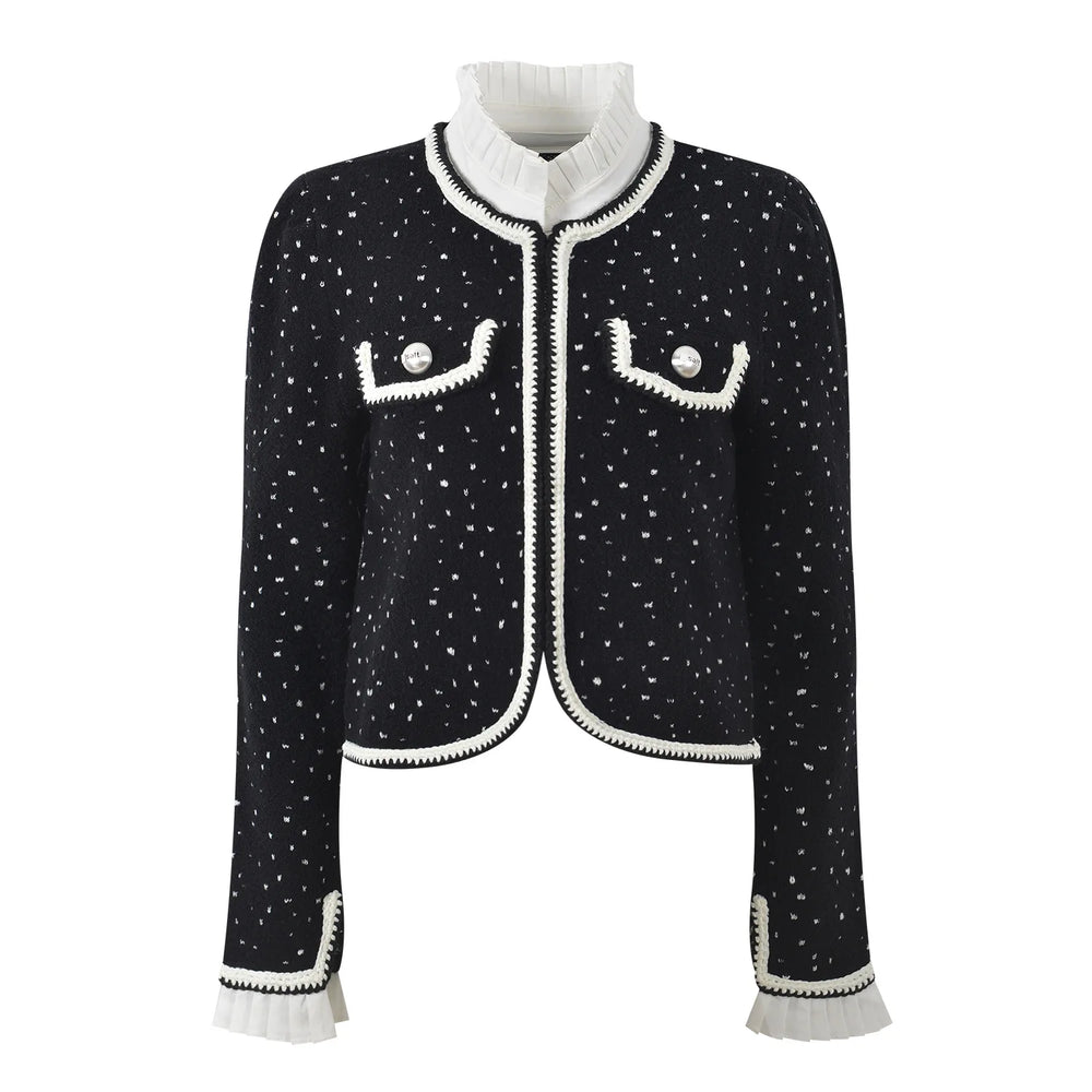 Black textured jacket with white trim on a white background