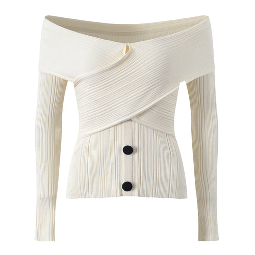 White ribbed knit cardigan with a button detail on a white background