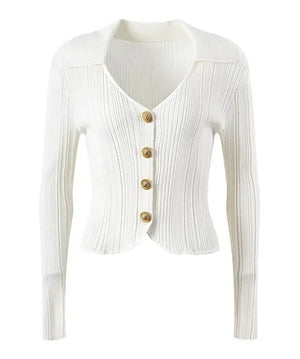 White ribbed knit cardigan with gold buttons on a white background