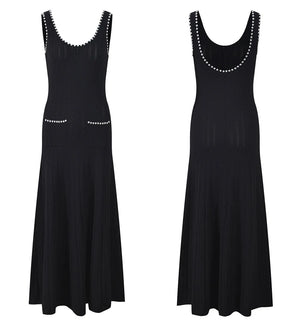 Black sleeveless dress with bead embellishments on a white background