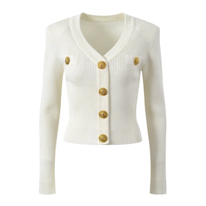 White ribbed knit cardigan with gold buttons on a white background