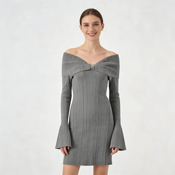 Woman wearing a gray off-shoulder dress on a white background