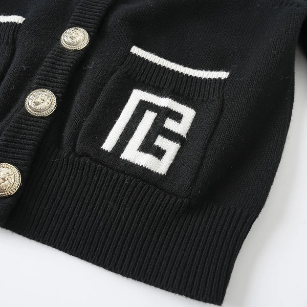 Black cardigan with a logo on the chest and buttons, on a white background
