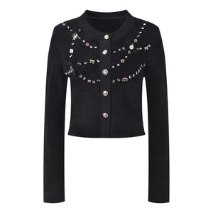 Black jacket with decorative buttons and embellishments on a white background
