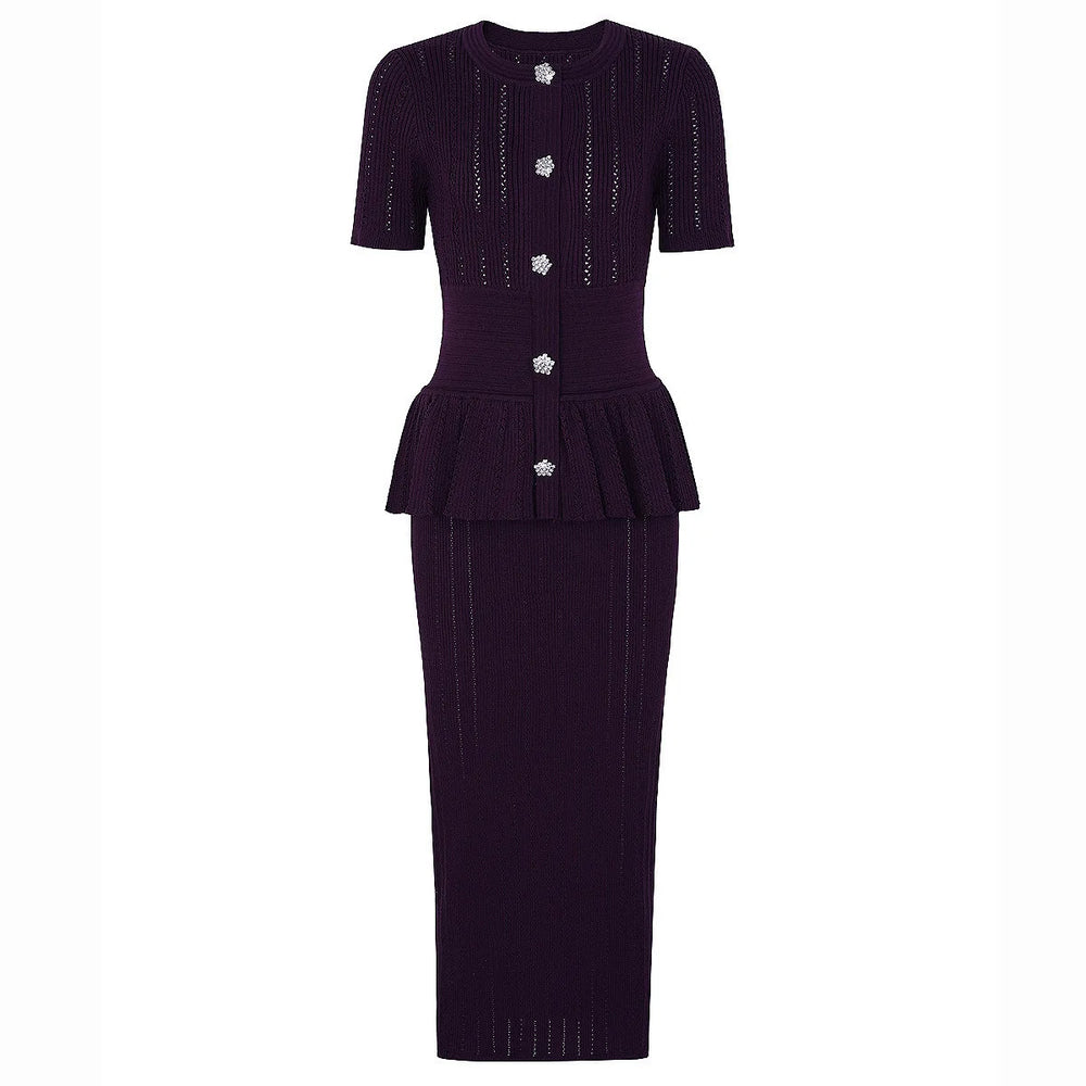 Dark purple dress with peplum waist on a white background