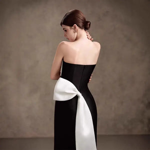 Off-the-Shoulder Sleeveless Midi Dress Mermaid-Trumpet Silhouette Natural Waist Big Bow Decoration back view