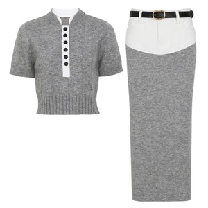 Gray short-sleeve knit top with black buttons and white collar, paired with a gray pencil skirt on a white background.