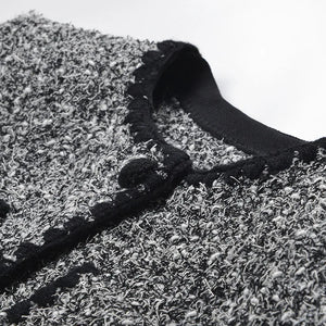 Close-up of a textured surface with a black strap