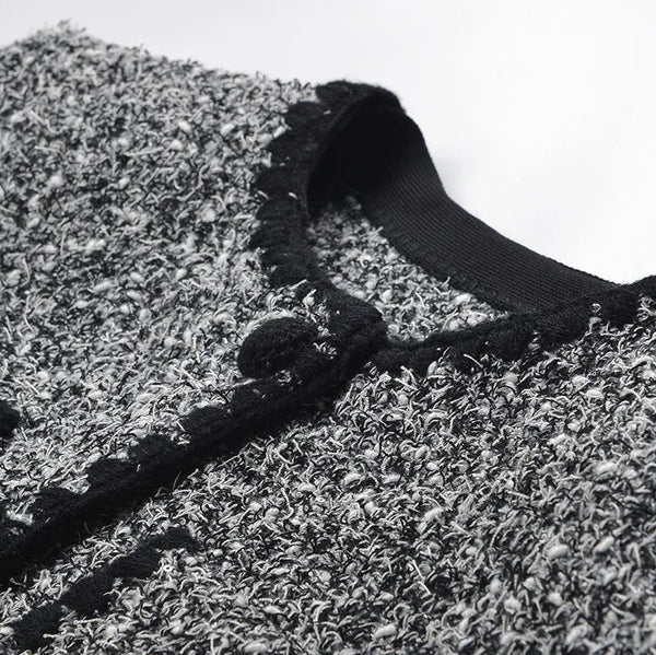 Close-up of a textured surface with a black strap