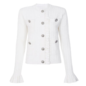 White jacket with silver buttons on a white background