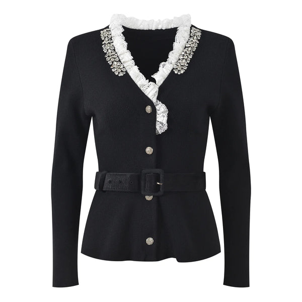 Black jacket with white lace collar and decorative buttons on a white background