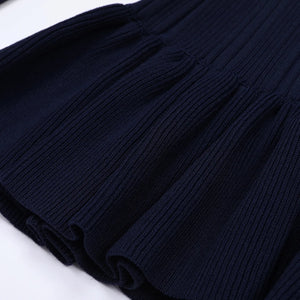 Dark blue ribbed fabric on a white background