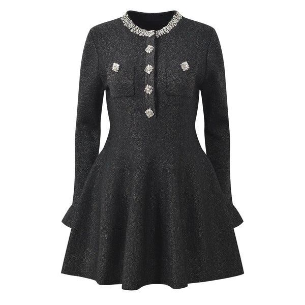 Black dress with decorative elements on a white background
