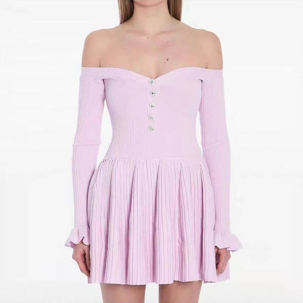 Pink ribbed dress with long sleeves on a white background