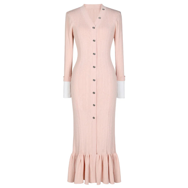 Pink dress with buttons on a white background