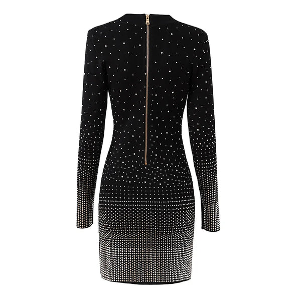Black dress with white embellishments on a white background