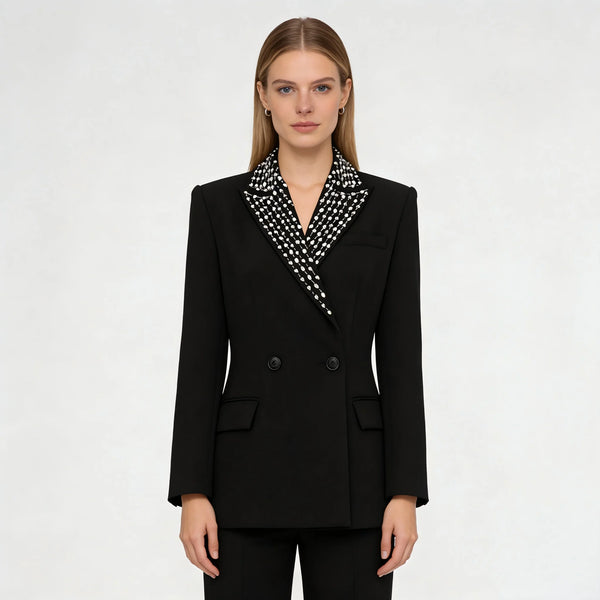 Black blazer with a patterned collar worn by a model on a white background