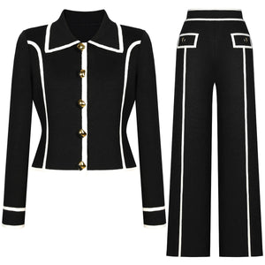 Black suit with white trim and gold buttons on a white background