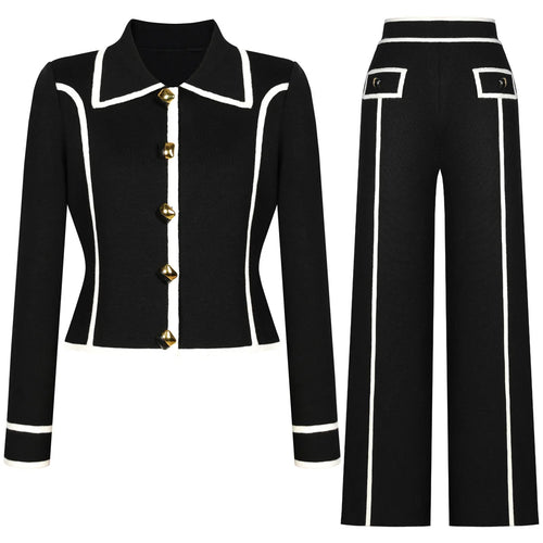 Black suit with white trim and gold buttons on a white background