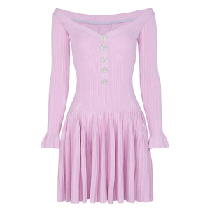 Pink ribbed dress with long sleeves on a white background