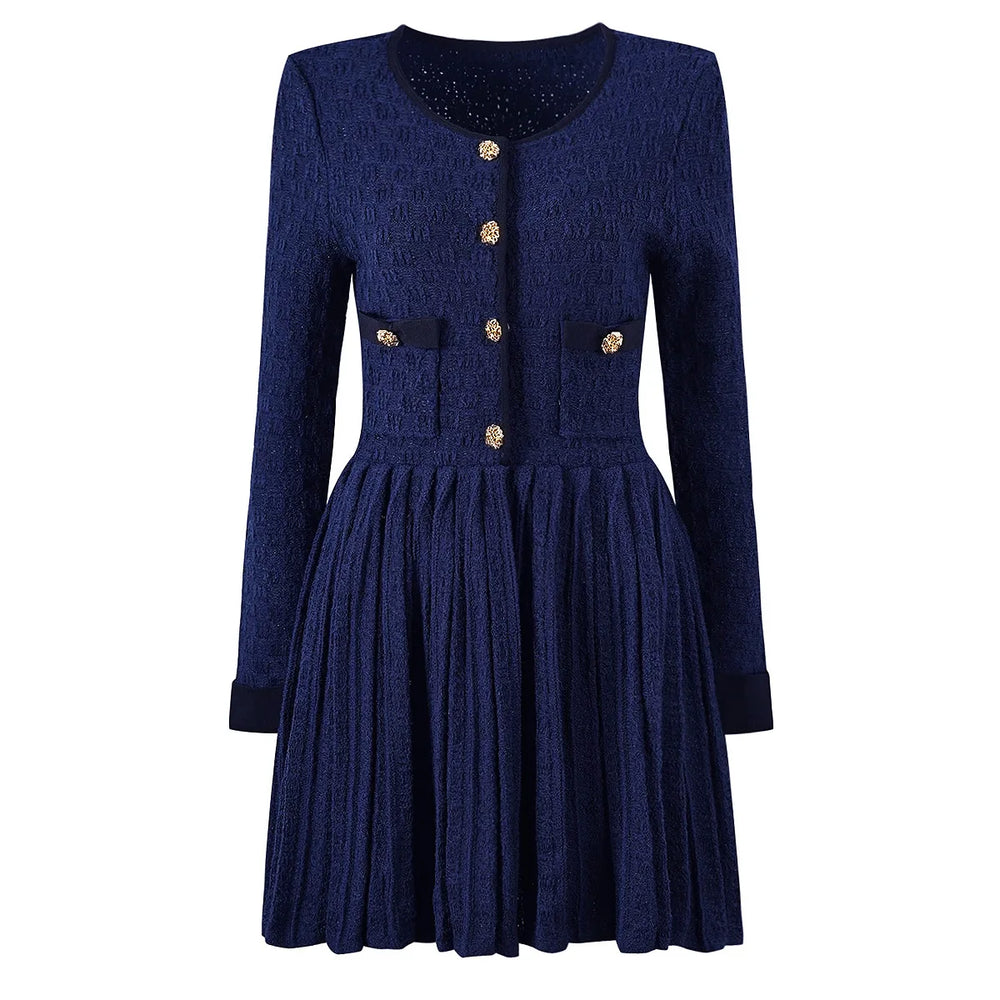 Navy blue dress with gold buttons on a white background