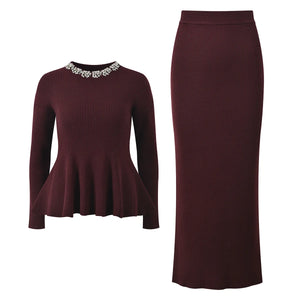Maroon ribbed sweater and skirt set on a white background