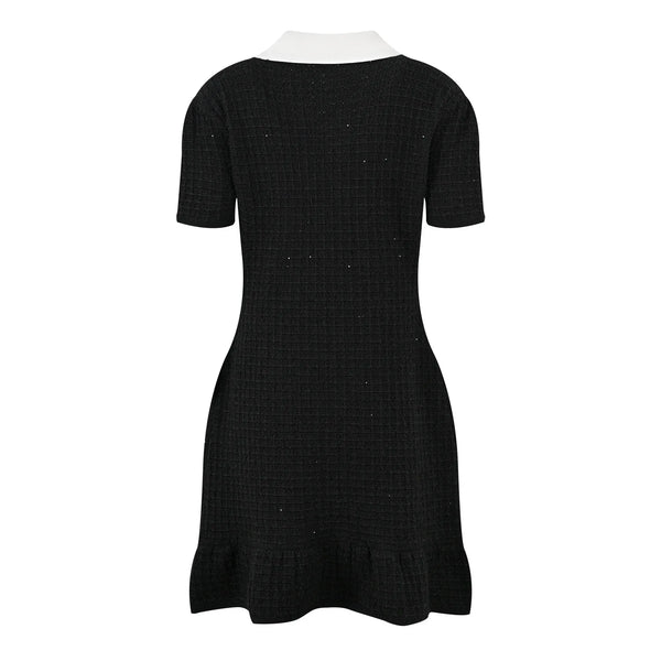 Black dress with white collar on a white background