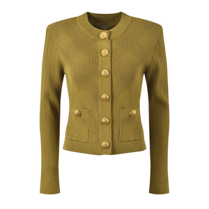 Green knitted jacket with gold buttons on a white background