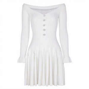 White ribbed dress with long sleeves on a white background