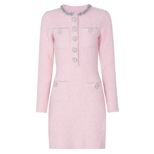 Pink coat with decorative buttons on a white background