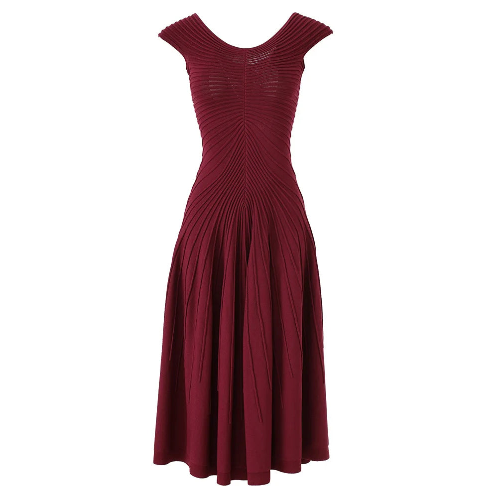 Maroon dress with pleated bodice on a white background