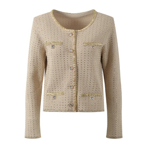 Beige textured jacket with decorative buttons on a white background