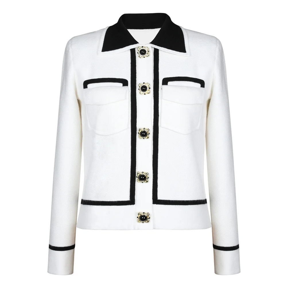 White jacket with black accents and decorative buttons on a white background