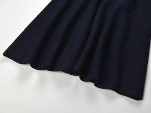 Navy blue fabric on a white background