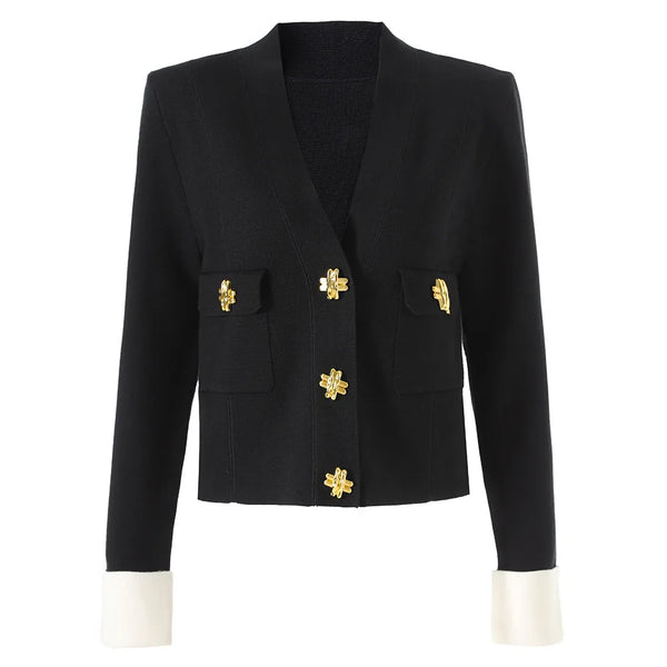 Black blazer with gold buttons on a white background