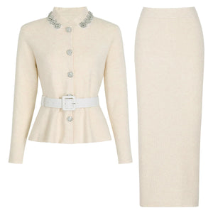 Cream-colored suit with a jacket and skirt on a white background