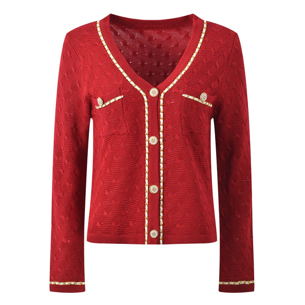 Red cardigan with gold buttons and trim on a white background
