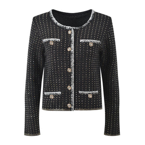 Black textured jacket with button details on a white background