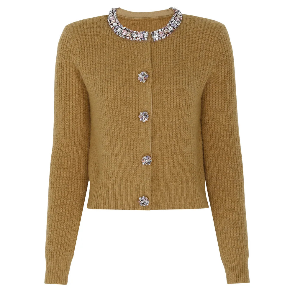 Mustard yellow cardigan with embellished collar and buttons on a white background