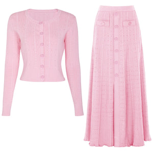 Pink cardigan and skirt set on a white background
