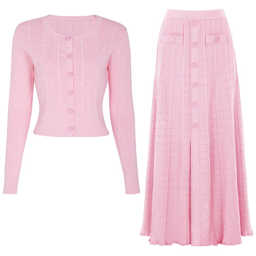 Pink cardigan and skirt set on a white background