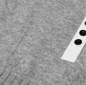 Gray textured fabric with buttons on a white background