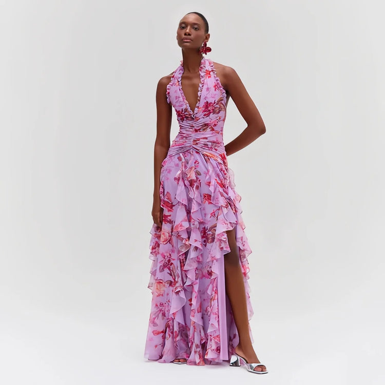 Woman wearing a pink floral dress on a white background