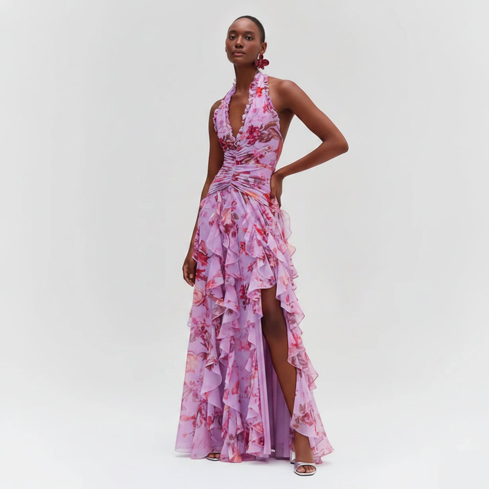 Woman wearing a pink floral dress on a white background