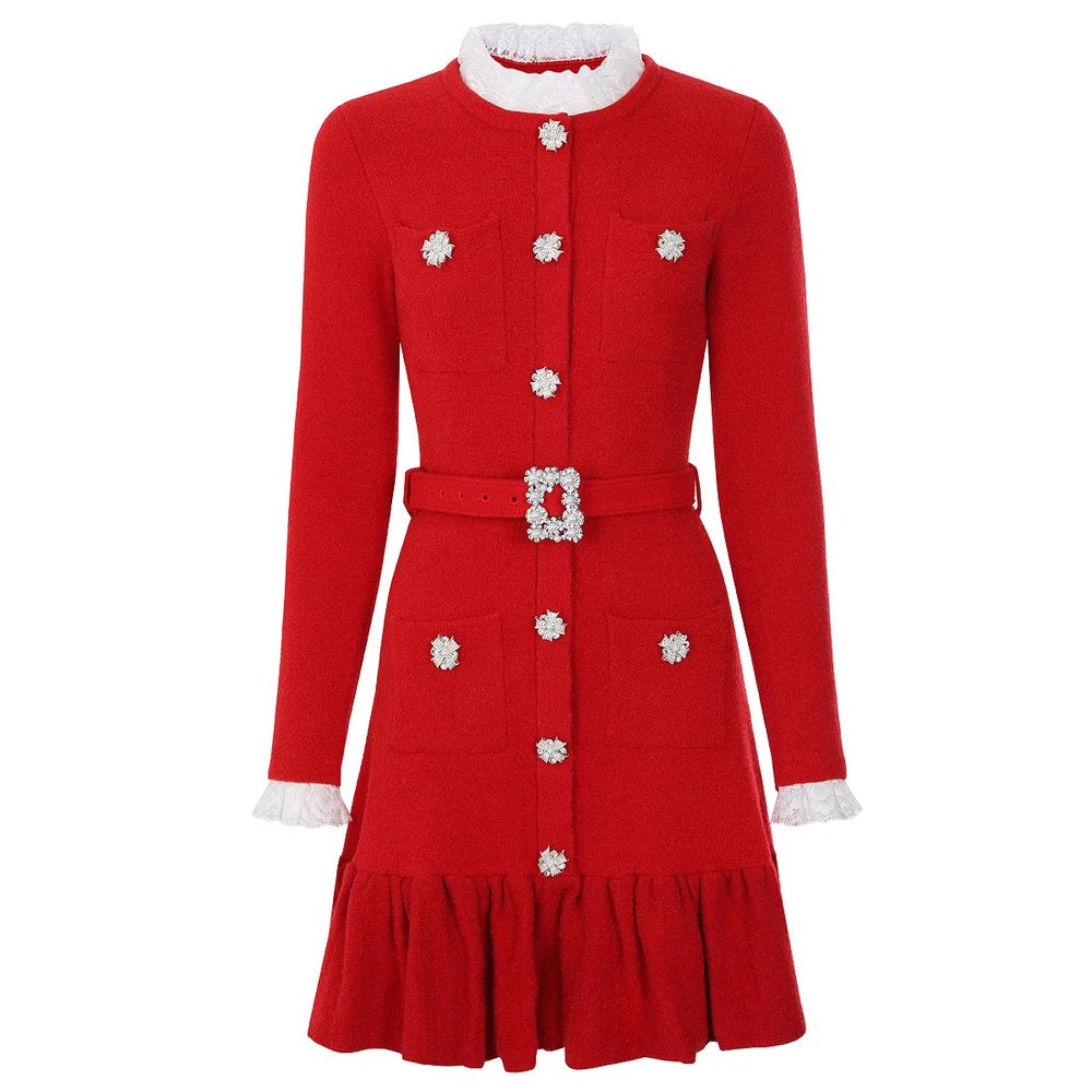 Black dress with silver buttons and a belt on a white background